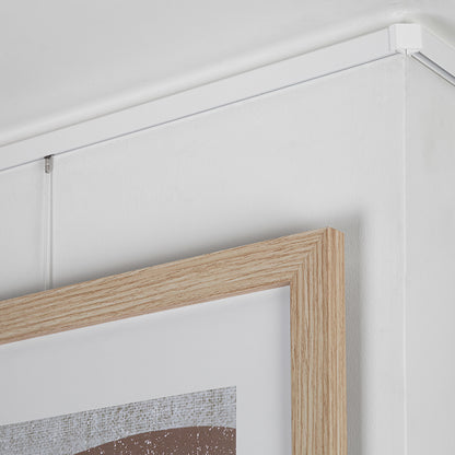 STAS minirail: système discret pour exposer peintures et art.