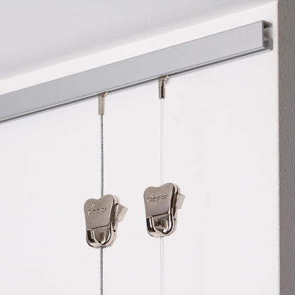 STAS minirail, cimaise fine 300 cm, accroche jusqu'à 25 kg/m, installation murale simple.